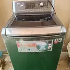 للبيع غسالة LG نظيفة 20Kg   معها قاعدة تفصيل