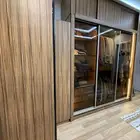 غرفة نوم دولاب زاوية وسرير واثنين كوميدينو وتسريحة