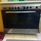 غساله اتوماتيك شبه جديده بوتوجاز خمس عيون شاشه 55 بوصه مع