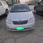 تويوتا كورولا 2005 قير عادي الممشى 500 وعليها