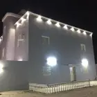 عمارة دورين مع حوش وغرفه خارجيه