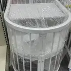 سرير أطفال شكل بيضاوي لونين