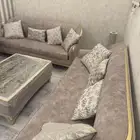 كنبين وطاوله وكرسيين