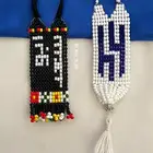 ميداليات مفاتيح خرز ب اسم ابو سعد و شعار الهلال