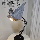 اضاءة مكتبية تصميم مميز على شكل مجسم سفينة فضائية