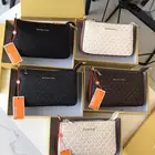 شنط مايكل كورس وكارولينا هريرا