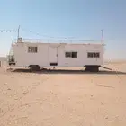 كرفانه  طول 11 متر قيها مجلس وغرفه ومطبخ ومروش