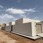 دور ارضي جديد المدائن تأسيس (شقتين) تأمين وضمانات على البناء