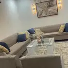 السيل الصغير كنبب مع الطاوله والفرشه