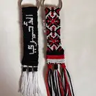 ميدالية مفاتيح بالعقدة الفاء الاحمري