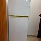 ثلاجة و طقم كنب