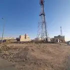 للبيع ارض تجارية زاويه بحي الرمال على طريق التغيره العام