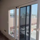 أعمال المنيوم شبابيك وأبواب ووجهات زجاجيه