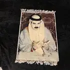 سجادة مخزنةنظيفة تحمل صورةالملك حمد ملك البحرين