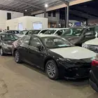 تويوتا كامري E 2025 - اصفار استاندر اسود سعودي