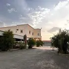 عماره دور وشقتين خلف شركه الغاز 1700م .للبيع مليون و600 الف