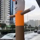دمية ترحبيه وقوس بلونات