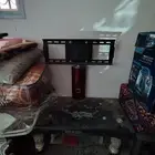طاوله تلفزيون مع قاعده وقلايه هاوئيه على السوم