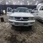 ونيت L200مستبوشي 2004بنزين مفحوص مجدد باقي لها شهرين