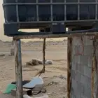 خزان فيبر مع كرسي حديد حالته طيبة