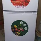 ثلاجة جديده في كرتونها نفس هذي الي بالصورة