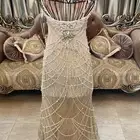 فستان ملكي لون اوف وايت وبطانة بيج فاتح مشكوك لولو كامل فخم