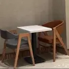 كراسي وطاولات مطعم وكوفي