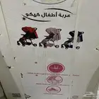 للبيع عربة اطفال جديد بالكرتون